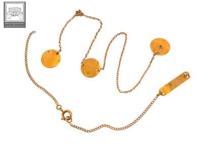 Lot d'or 18K 750/°°° comprenant : 
- Chaînette,...