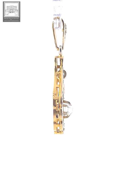 Pendentif
Or jaune et gris 18K 750/°°° poinçon...