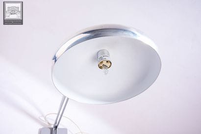LIGNE ROSET 
Lampe à poser dite liseuse 
Inox...