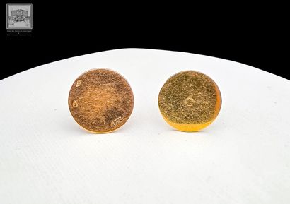 Paire de boutons de col
Or jaune 18K 750/°°°...