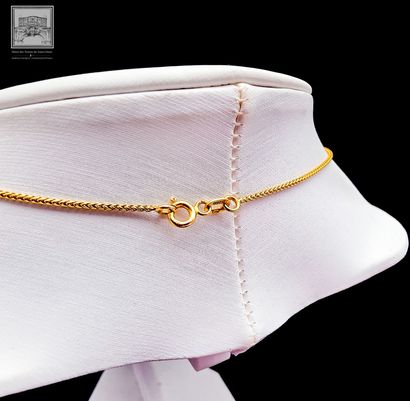 Pendentif + Collier
Or jaune 18K 750/°°°
Pendentif...