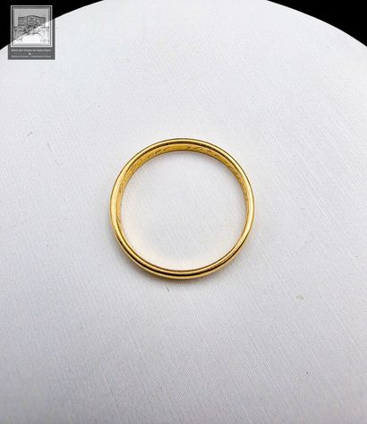 Alliance en or jaune 18K 750/°°°
Inscription...