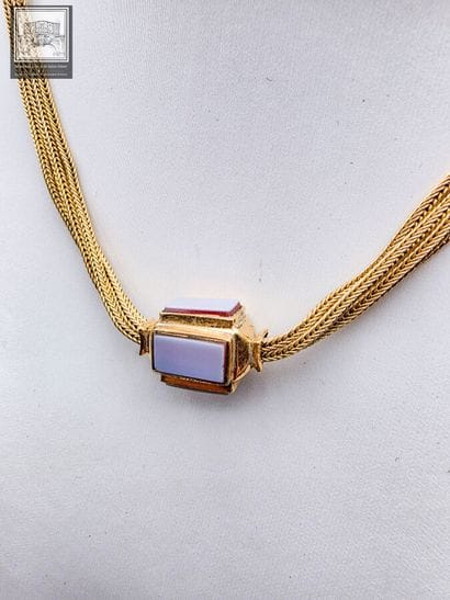 Chaîne de montre en or jaune 18K 750/°°°
Poinçon...