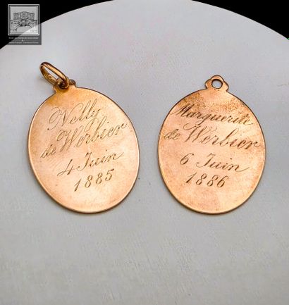 Ensemble de 2 pendentifs en or 18K 750/°°°
Poinçon...