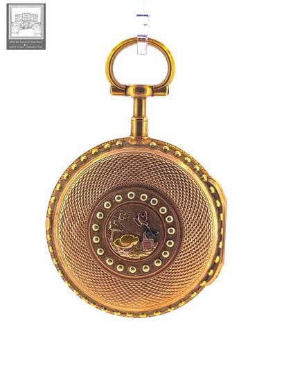 Montre de col
or jaune et rose 18K 750/°°°
Boitier...