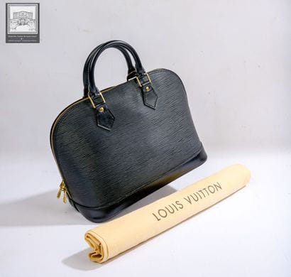 LOUIS VUITTON
Sac modèle 