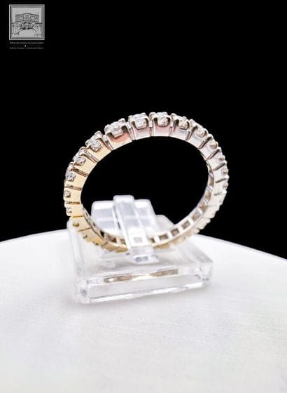 Bague alliance américaine
en or gris 18K...