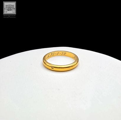 Alliance 
en or jaune 18K 750/°°° 
poinçon...