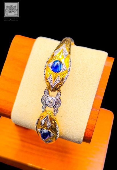 Bracelet rigide
Or jaune 18K 750/°°° et platine...