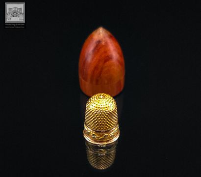 Dé à coudre en or jaune 18K 750/°°°
Poids...