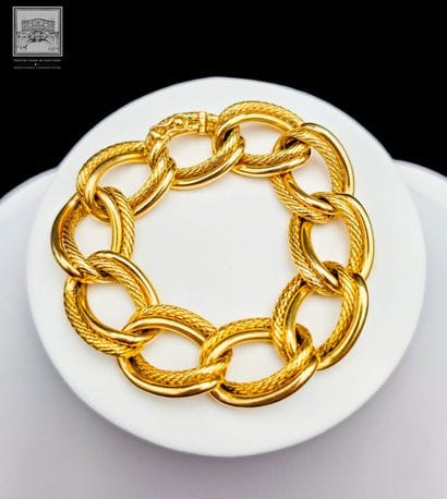 Bracelet articulé en or jaune 18 K 750/°°°,...