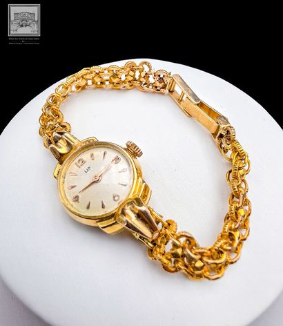 LIP 
Montre boitier et bracelet en or 18K...