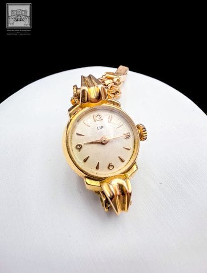 LIP 
Montre boitier et bracelet en or 18K...