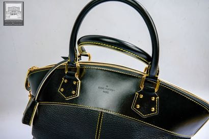 LOUIS VUITTON.
SAC à main modèle Lockit 
Cuir...