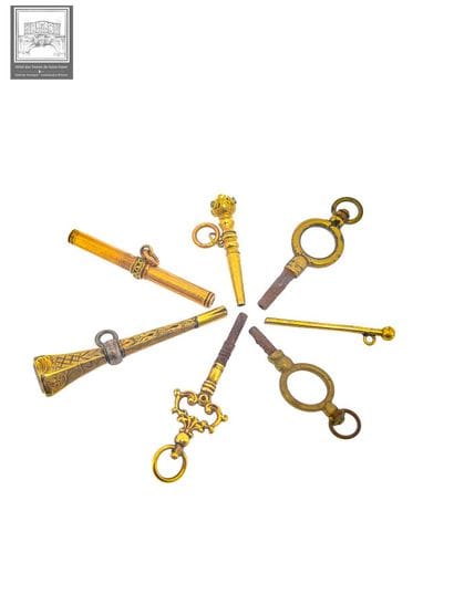 Lot de 4 clés de montre en or jaune et rose...