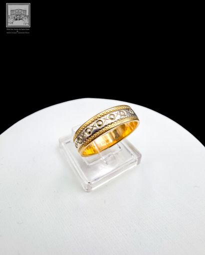 Alliance 
Or jaune et gris 18K 750/°°°
Poinçon...