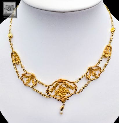 Draped necklace 
750/°°° openwork yellow...