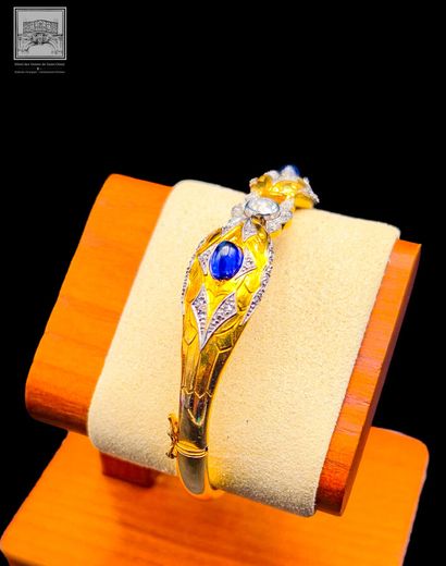 Bracelet rigide
Or jaune 18K 750/°°° et platine...