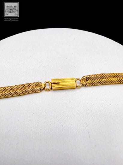 Collier maille chevron en or jaune 18K 750/°°°
Poinçon...