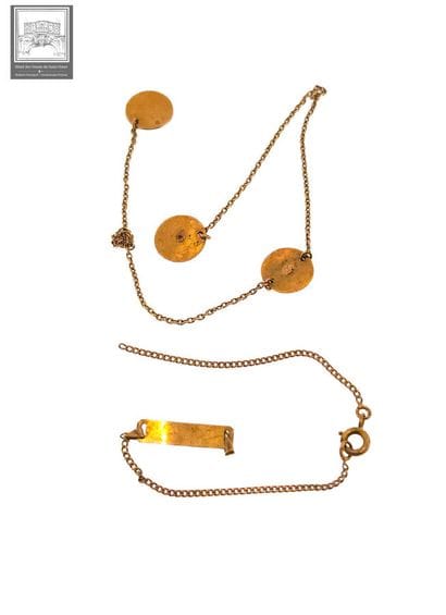 Lot d'or 18K 750/°°° comprenant : 
- Chaînette,...