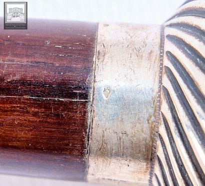 Canne avec pommeau en argent 800/°°°
Poinçon...
