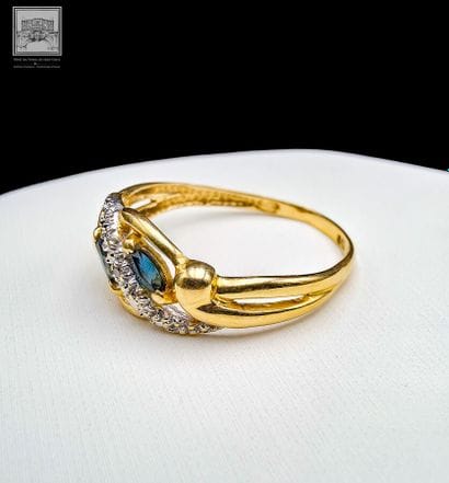 Bague
Or jaune 18K 750/°°°
Sertie 2 petits...