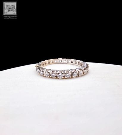 Bague alliance américaine
en or gris 18K...