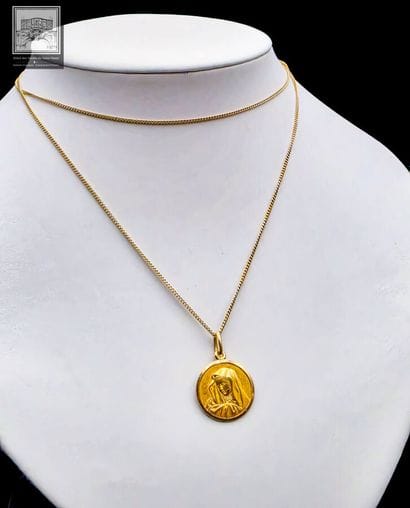 Collier + pendentif en or jaune 18K 750/°°°...