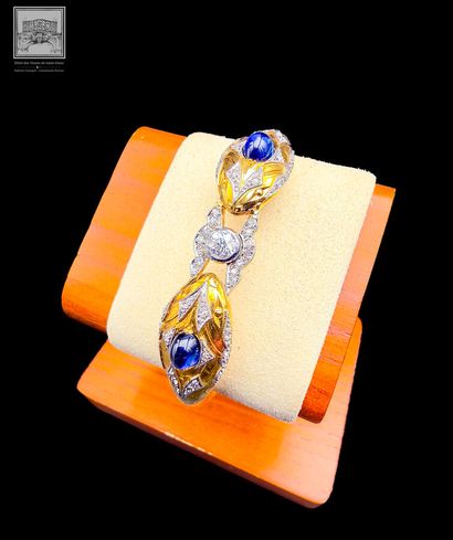 Bracelet rigide
Or jaune 18K 750/°°° et platine...
