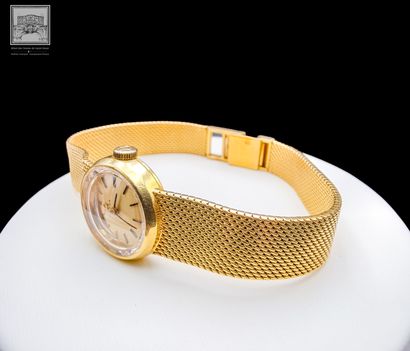 OMEGA, montre bracelet de dame rond
Or jaune...