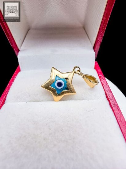 Pendentif en or jaune 18K 750/°°°
Poinçon...