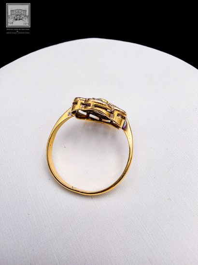 Bague sertie d'une perle au centre et de...