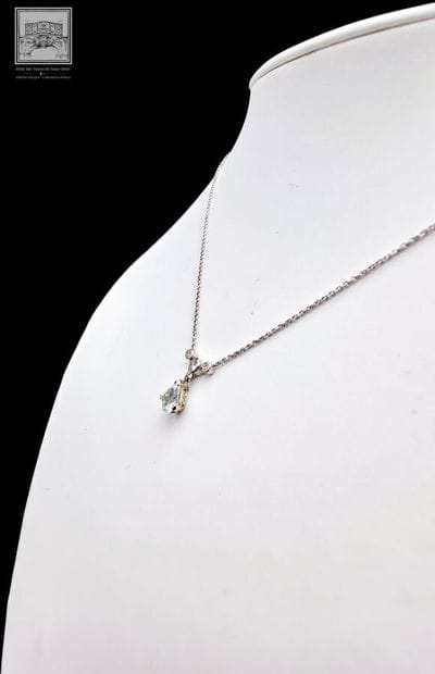 Necklace + Pendant
750/°°° white gold, eagle-head...