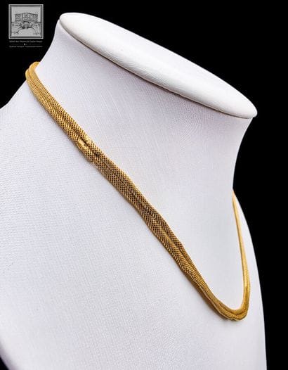 Collier maille chevron en or jaune 18K 750/°°°
Poinçon...