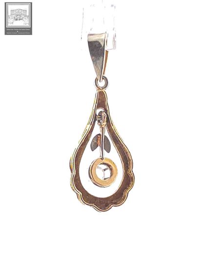 Pendentif
Or jaune et gris 18K 750/°°° poinçon...