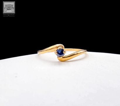 Bague
Or jaune 18K 750/°°°
Sertie d'un petit...