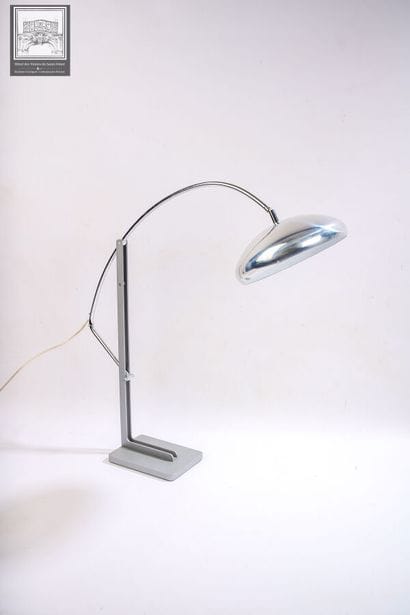 LIGNE ROSET 
Lampe à poser dite liseuse 
Inox...