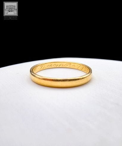 Alliance en or jaune 18K 750/°°°
Inscription...