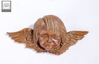 Angelot en chêne sculpté 
Epoque XIXe siècle...