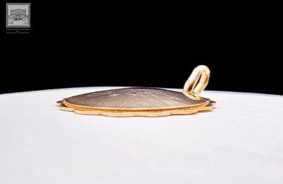 Médaille en or jaune 18K 750/°°°
Poinçon...
