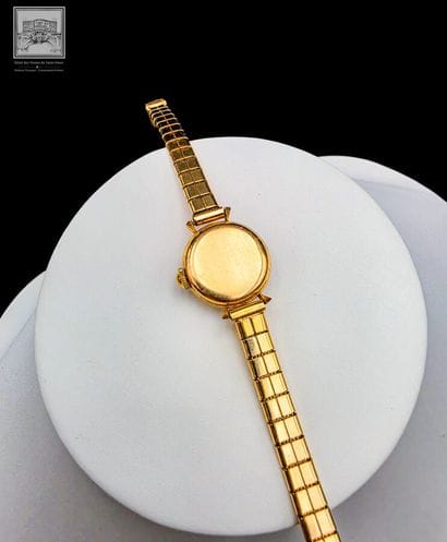 DERMONT
Montre de dame 
Boîtier en or jaune...