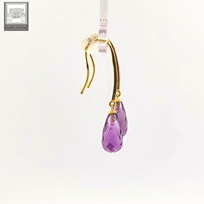 A beautiful pair of 750°/ (18K) yellow gold...