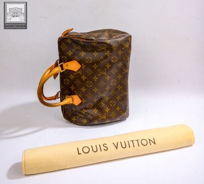 LOUIS VUITTON,
Sac modéle Speedy 30 en cuir...