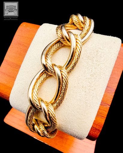 Bracelet articulé en or jaune 18 K 750/°°°,...