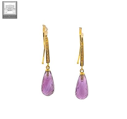 A beautiful pair of 750°/ (18K) yellow gold...