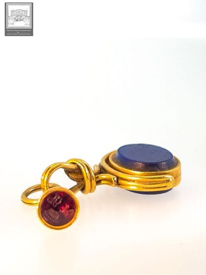 Double cachet de pouce en or 18K 750/°°°
Poinçon...