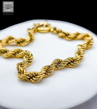Bracelet en or jaune 18K 750/°°° poinçon...