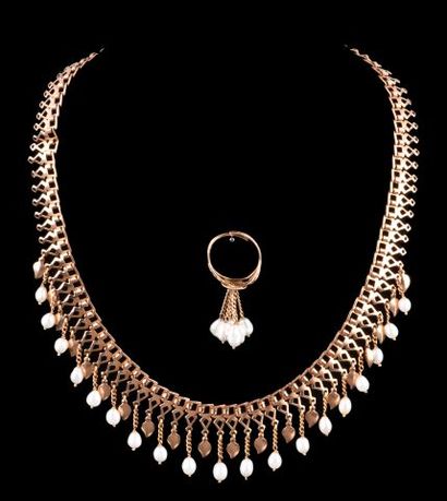 Set in pink gold 14K 585 thousandths composed...