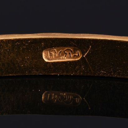 Deux bracelets jonc en or jaune 18K 750 millièmes...