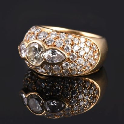 18k yellow gold ring set with a large pavement...